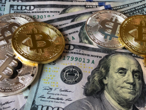 Dollar bills and bitcoins
